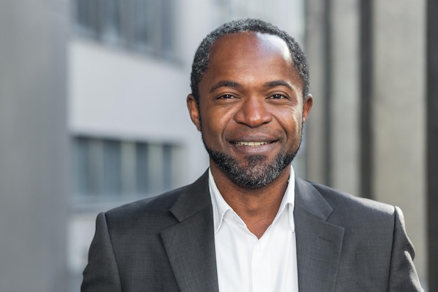 African american businessman close up mature man smiling and looking at camera senior boss in