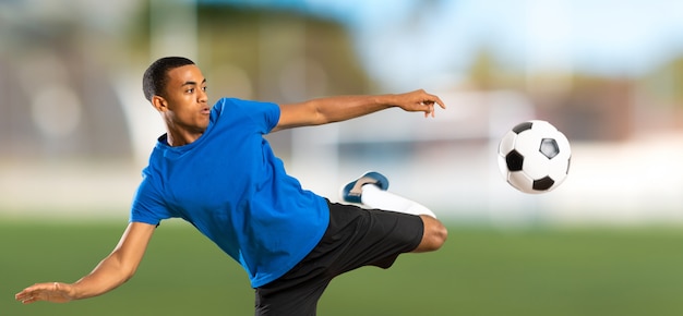 African American football player man at outdoors