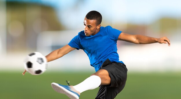 African American football player man at outdoors