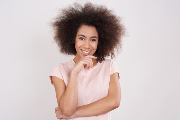 African american girl playfully poses isolated.