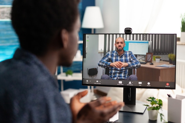 African american man on online video call communication