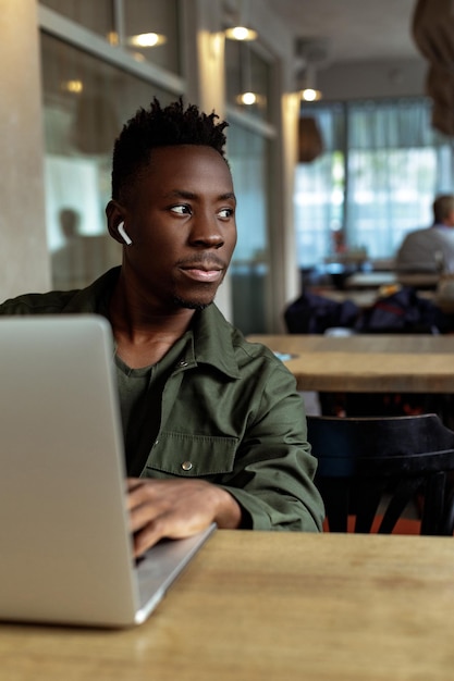 African american man using computer