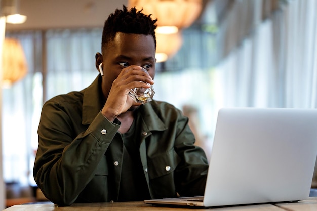 African american man using computer