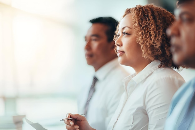 African American mature businesswoman student sitting learning listening in education training