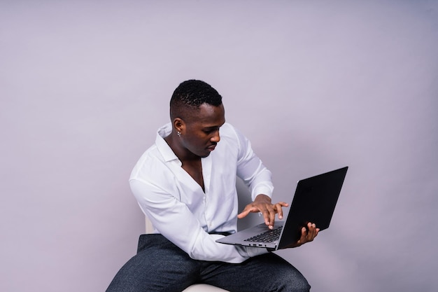 African american millennial businessman isolated on studio background successful male formal suit