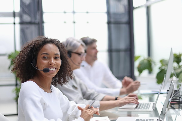 African american operator smiling in a call center