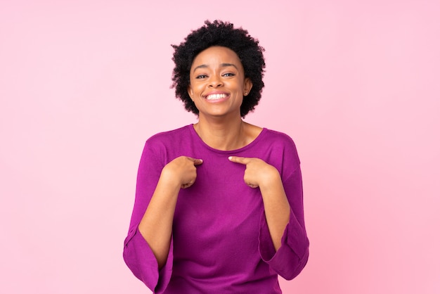 African American woman over pink wall