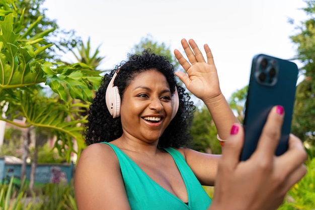 African american woman with video call