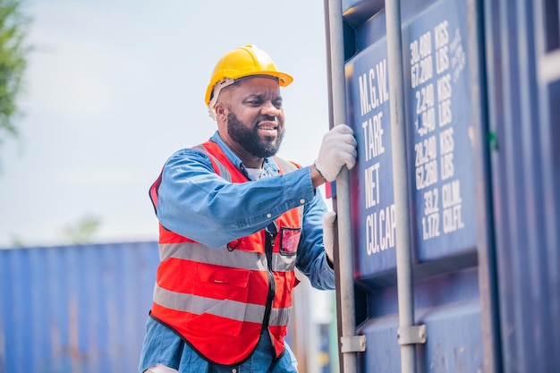 African American worker concept African American worker working in warehouse containers for logistic import export Black man worker