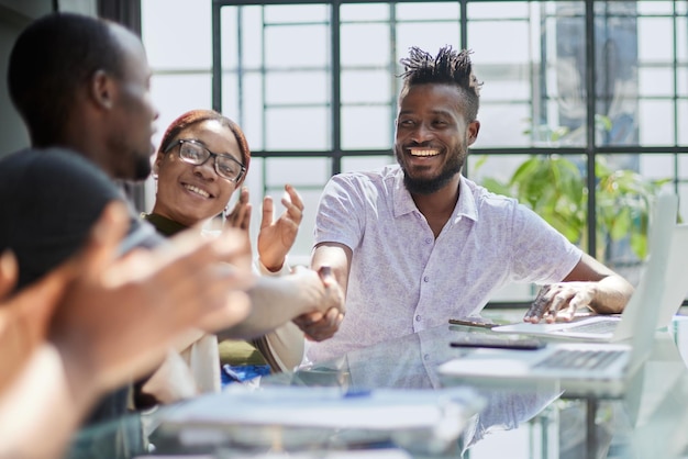 African business people handshake at modern office