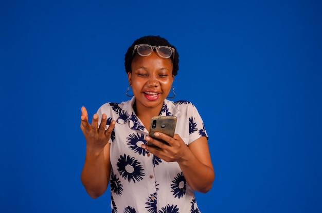 African businesswoman using mobile phone