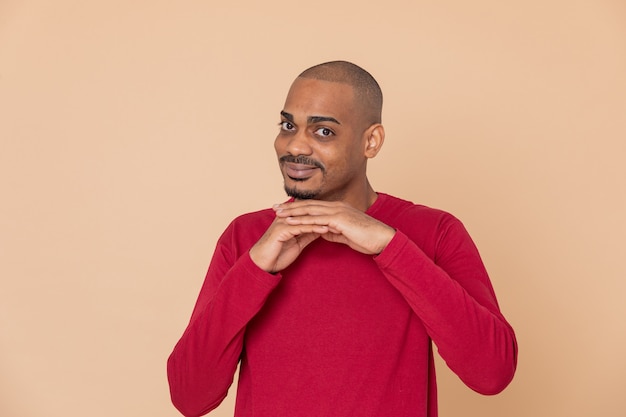 African guy with a red sweatshirt