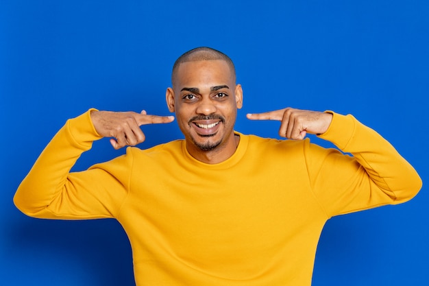 African guy with yellow jersey