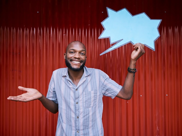 African man outdoor and speech bubble in portrait doubt or promotion with mockup space on social media Student gen z guy and unsure smile with blank poster billboard or presentation for feedback