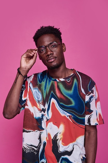 African stylish teenage boy in eyeglasses