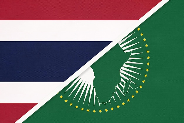 African Union and Thailand or Siam national flag from textile Africa continent vs Thai symbol