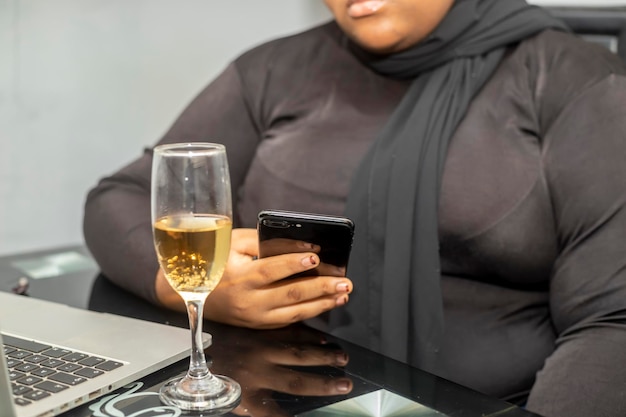 African WoMan using smartphone at home