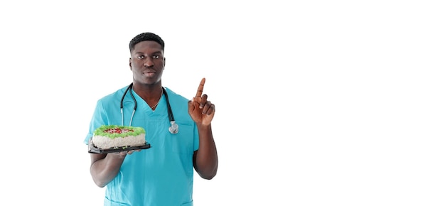 An AfricanAmerican doctor forbids eating sweets the concept of proper and healthy nutrition