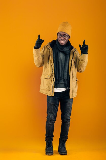 Africanamerican man posing on gray background