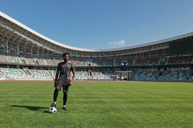 Afro american ball player in the stadium