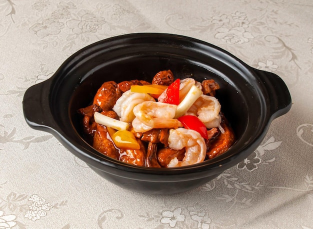 Agaricus Blazei Shrimp and Tofu Casserole served dish isolated on background top view of hong kong chinese food