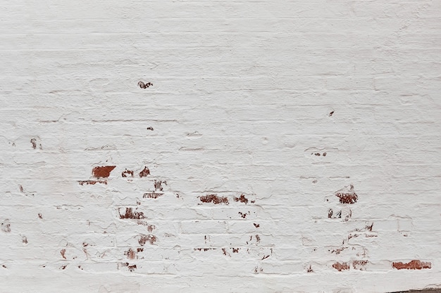 Aged brick wall painted white with red bricks
Background Brick Wall Horizontal Texture