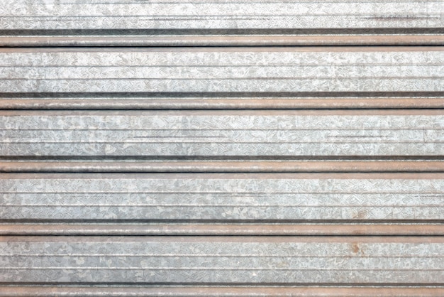 Aged closeup metal garage door texture