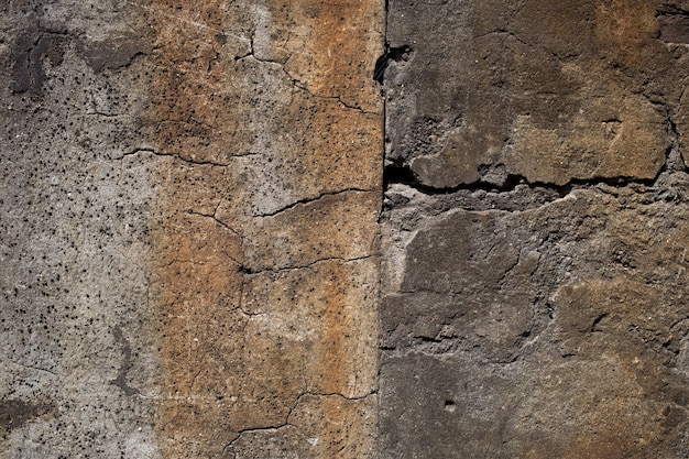 Aged concrete background with cracks and scuffs