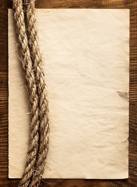 Aged Rope on the old paper background