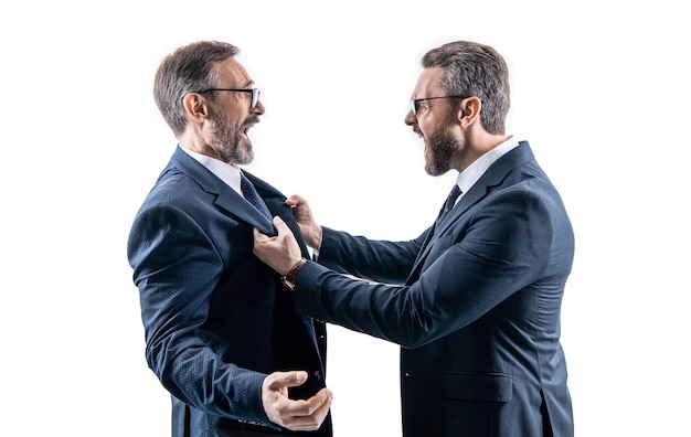 Aggressive businessmen fighting in studio fighting businessmen shouting photo of businessmen