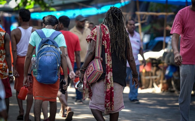 An aghori walking on road hd