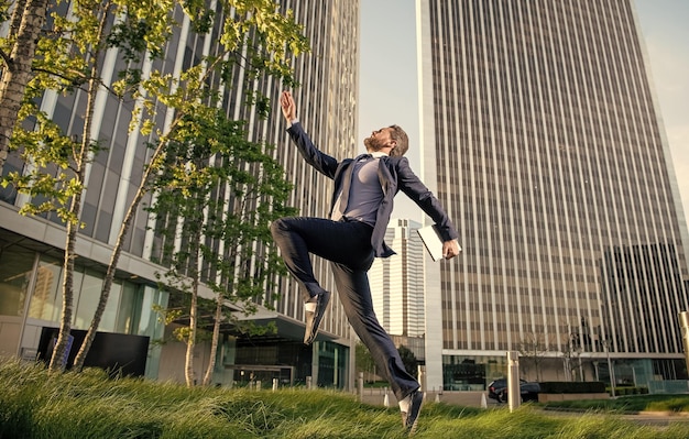 Agile business professional network administrator hold computer boss with modern wireless laptop