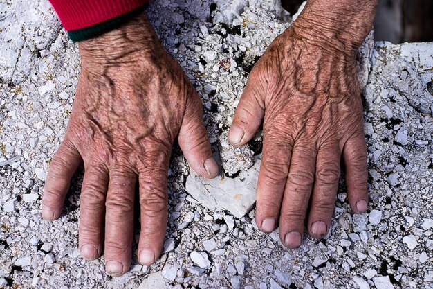 Aging process - very old senior woman hands wrinkled skin