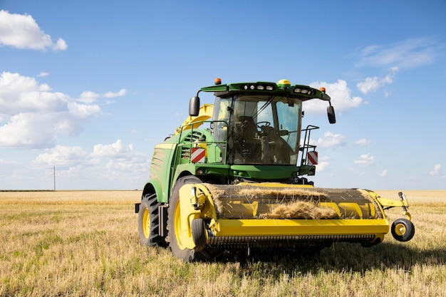 Agricultural machinery in operation in the fields. A new trend in technology