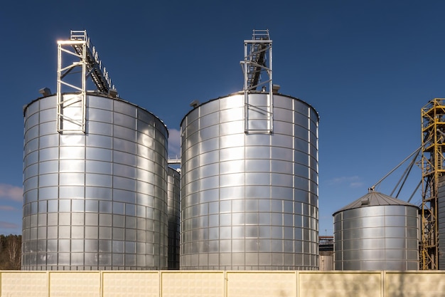 Agro silos granary elevator on agroprocessing manufacturing plant for processing drying cleaning and storage of agricultural products flour cereals and grain