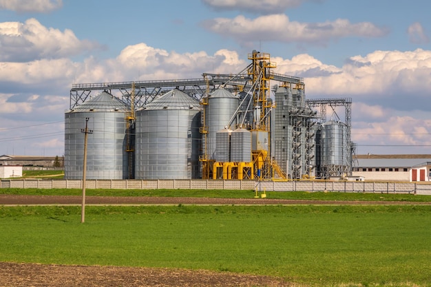 Agro silos granary elevator on agroprocessing manufacturing plant for processing drying cleaning and storage of agricultural products flour cereals and grain