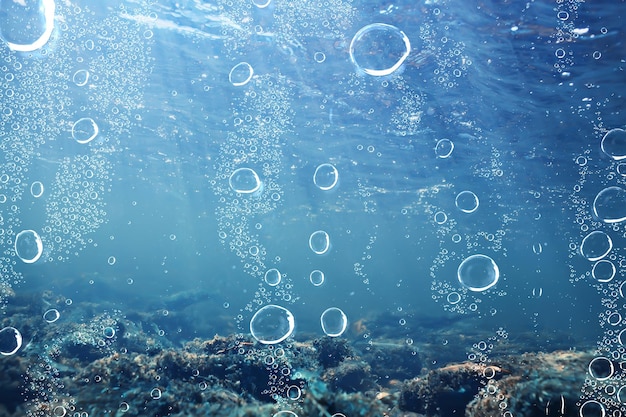 air bubbles underwater blue background, ocean depth diving