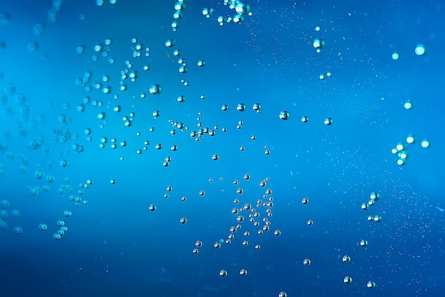 air bubbles in water macro background / blue background abstract bubbles in water