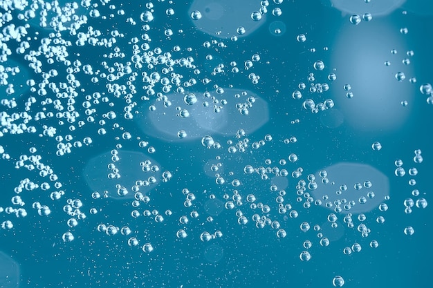 air bubbles in water macro background / blue background abstract bubbles in water