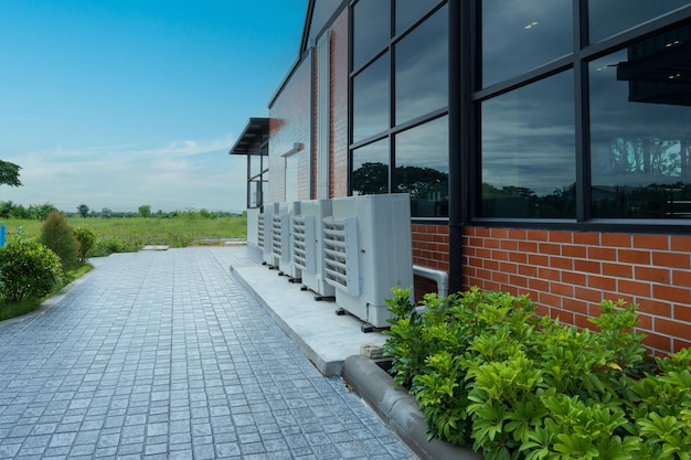 Air compressor or condenser unit installed outside building Outdoor split air conditioner of the office