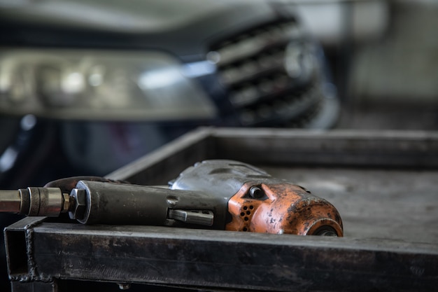 Air impact wrench in service shop repairing