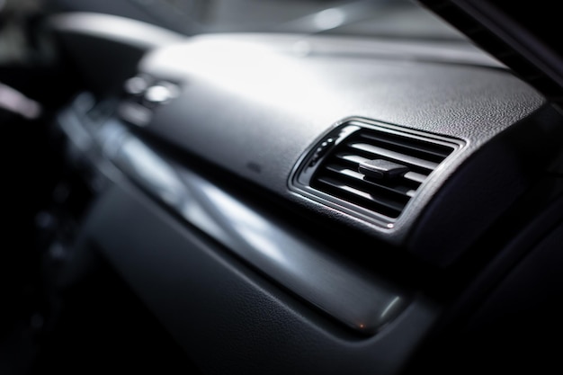 Air vent grill and air conditioning in modern car interior