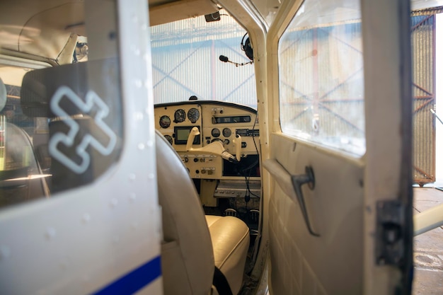 Aircraft cockpit seen from outside with door ajar