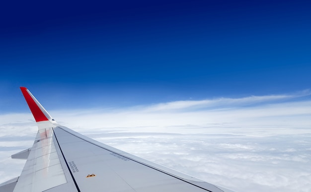 Aircraft fly over the cloudy sky