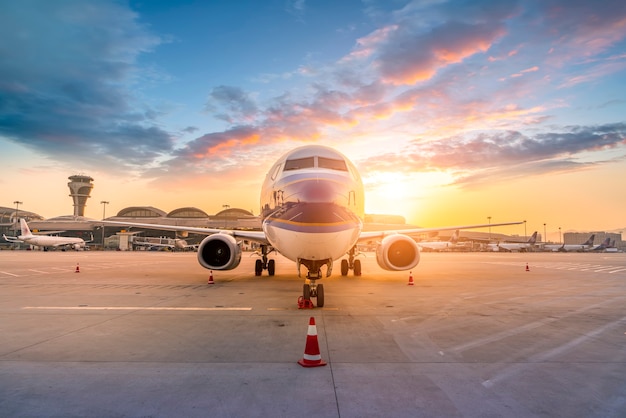 Airliner on airport runway and apron