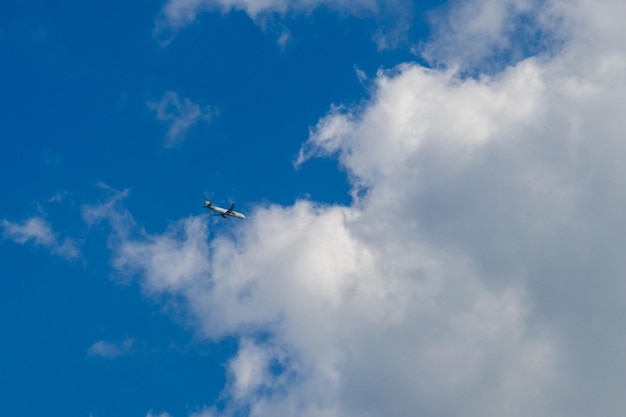 Airplane flying in the blue sky