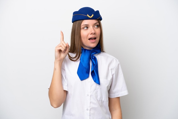 Airplane Lithuanian woman stewardess isolated on white background intending to realizes the solution while lifting a finger up