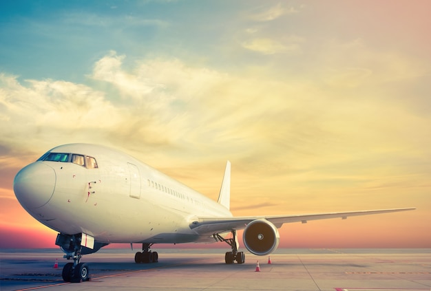 airplane parking with sunset 