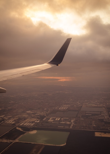 airplane sky travel city clouds