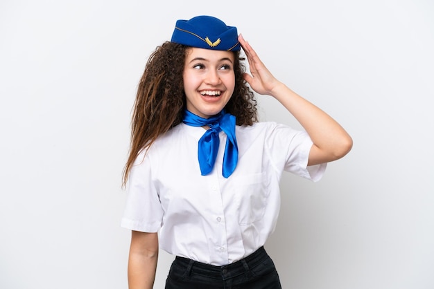 Airplane stewardess Arab woman isolated on white background has realized something and intending the solution